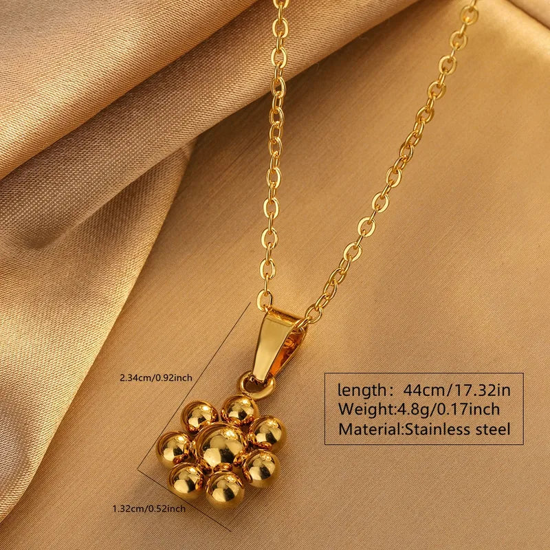 Conjunto Flor Dorada | Acero Inoxidable Chapado en Oro 18K